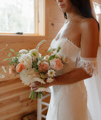 Wedding bouquet of roses and cosmos from Flowergirl Cville. Brittany Stark Studios.