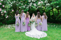 Los Angeles wedding photography drone photo of the bride and bridesmaids in the garden at Secluded Event Spot, captured from above with true to life color and a clean fine art look.