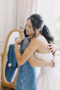 Bride Mom Hug | Chateau de Santeny Luxury Wedding Photography France | Juno by Julia C. Vona