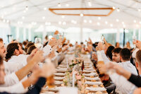 Cheers during speeches at Poachers Pantry wedding reception