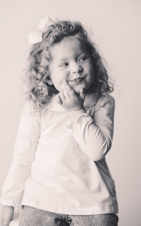 Toddler poses for Personality Portraits at Holy City Babies Portrait Studio in Charleston, SC.
