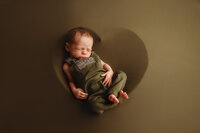 Newborn Photographer in Charleston - Newborn Baby sleeping during Newborn Portrait Session in Charleston, SC.