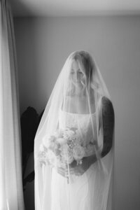 Black and white bride prep wedding photography in Christchurch