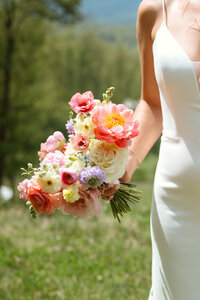 Bridal bouquet of peonies and garden roses, created by Flowergirl Cville. Photography by Jessa Rose.