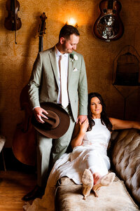 Couple posing inside Urban Cowboy in Nashville during their elopement photoshoot with Nashville Elopement Company
