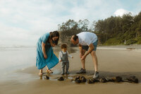 Family on the Carolina coast looking for shells