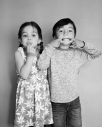 two kids make silly faces for some simple family portraits - photographed on 120 mm film on the Yashica Mat 124g