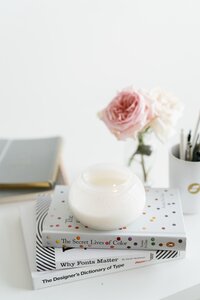 Desk with books and Candle