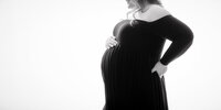 black and white maternity photo in studio