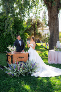 Bride and Groom garden wedding ice cream cart at rainbow oaks ranch in sanger california