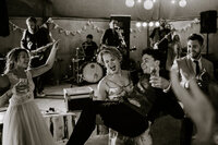 groom dancing with guests