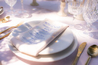 garden wedding plate setting with linen menu and shadows at rainbow oaks ranch in sanger california