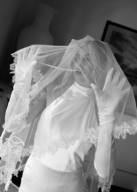 Bridal shots taken with a veil at a wedding in Florida.