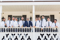 Groomsmen prepare for the wedding day at Crossed Keys Inn