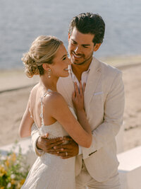 Basking in the golden glow of a citrus summer at the iconic Bahia Resort in San Diego, I had the absolute pleasure of capturing a scene of serene elegance. Tucked away in a secluded tropical garden, a charming pergola set the stage for beautifully arranged florals and meticulously styled table settings—a true mid-century retreat infused with modern whimsy. Every detail, from the vibrant citrus accents to the delicate blossoms, spoke of timeless sophistication and effortless charm.
