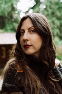 Graphic designer photographed in a cinematic portrait inspired by her distinct creative perspective.