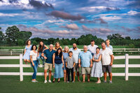 Multi generational family portrait at sunset on rural property in Eastern North Carolina