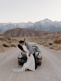 Wedding Photos of an edgy couple in Lone Pine, California with a vintage porsche car