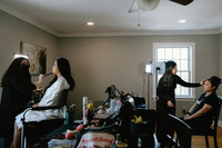Bride getting ready at Crossed Keys Inn. Wedding Weekend Sussex County Local Lodging.