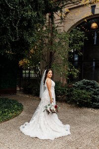 Bridal portrait outside The Refinery, a popular wedding venue near Louisville