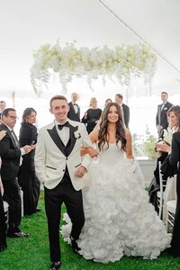 couple walks down aisle