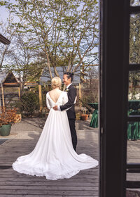 Couple spending a quiet moment together before their wedding ceremony at Mildred Hall in Portland, Oregon