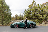 Branding lifestyle photo of a Bend Oregon professional through a forested road