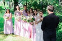 Romantic wedding vows in a Los Angeles venue garden with natural light, emotional moments, and documentary style photography.