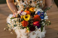 a close up shot of a colorful bouquet