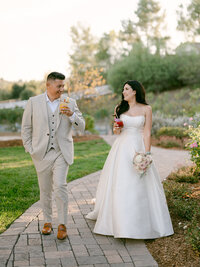 Luxury Temecula wedding photographed by Michael Asmussen, featuring refined fashion, elegant décor, champagne celebrations, and a Sophisticated editorial wedding style in Southern California wine country.