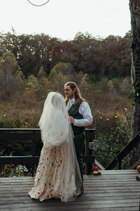Newly married couple doing documentary and cinematic photos for their wedding / elopement at their blue ridge airbnb. Photos by Crimson Conure Photography based in Kennesaw, Georgia and Denver, Colorado