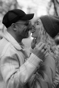 Pure joy and laughter captured in a black and white couple portrait - timeless cinematic style by Lucie Muse