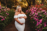 Maternity Photos in Charleston, SC -- Expectant mother poses for Maternity Portraits at Hampton Park in downtown Charleston, SC.