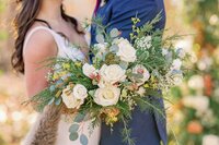 Bride with ivory and eucalyptus bridal bouquet featuring dried nigella by Flowergirl Cville, Charlottesville wedding florist | Photo by Xiaoqi Li Photography