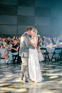 a bride and groom first dance at the Relevant Center in Elkhorn