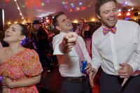 Guests enjoy dancing during tented wedding reception on Nantucket.