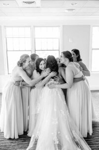 black and white wedding photo of bride and bridal party in NYC