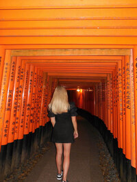 Walking through 10,000 torii gates at Fushimi Inari shrine in Kyoto