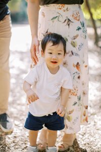 Young boy smiling at the camera