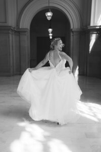 san francisco city hall bride running through hall