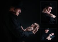 New father gently cradling his newborn baby during a heartfelt newborn portrait session, celebrating the bond between father and child.