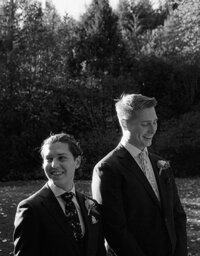 gay grooms smiling after getting married in Squamish