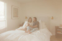 parents-bed-newborn-dreamy-light-modern-bedroom-boulder-in-home-session-41