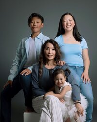 Parents and children laughing together during Sherwood Park family session