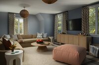 dalay home austin interior designer entertainment area with large sectional and blue walls