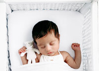 Image of sleeping baby at a studio newborn photography session by Hobart Newborn Photographer Lauren Vanier