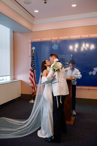 Japna and Chris share their first kiss as a married couple during their NYC City Hall wedding ceremony