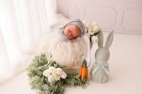 Newborn Pictures in Charleston - Infant posed for Newborn Pictures during Newborn Photoshoot at Holy City Babies Newborn Photography Studio in Charleston, SC.