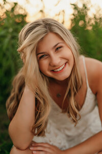 A young woman from Kettle Moraine High School visits Delafield's Lapham Peak to capture her senior portraits.