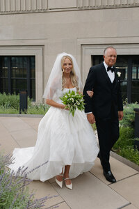 Fashion forward editorial wedding photography showcases ceremony elegance at Old Post Office Chicago, featuring Lauren Alatriste's sophisticated approach combining architectural beauty with magazine-worthy aesthetics and authentic wedding day emotion.